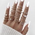 Set of 23 gold bohemian rings with butterfly and pearl designs on model hand - Gold Style (HS1546-8) / 18 Pieces Set