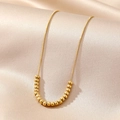 Squisita collana di perle in acciaio inossidabile placcato oro su tessuto di seta - Stile Catena con Perline Dorata (BXG037-6)