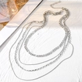Collier multicouche argenté avec chaînes serpent, figaro et box pour un style élégant - Quatre Couches Figaro Serpent Argentée (HS1838-15)