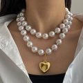 Double-layered oversized pearl necklace with a polished gold heart-shaped pendant - White Double Layer Artificial Pearl Gold Heart Necklace (HS1979-6)