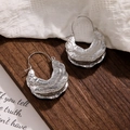 Macro detail of textured silver metal earrings with artistic molten lava surface design - Silver Double Layer Hammered Irregular Style (HS1930-Silver-10)