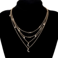 Layered gold necklace featuring moon pendants and sparkling crystals on black display - Four Layer Moon Teardrop Rhinestone Necklace (HS1879-6)