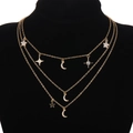 Gold layered necklace with star and moon charms and rhinestones on black velvet - Three Layer Moon Star Rhinestone Necklace (HS1879-7)