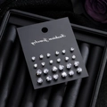 12 pairs of heart and round cut cubic zirconia stud earrings set on black card - Heart and Round Style (HS1924-1)