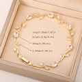 Close-up of gold leaf bracelet with 20cm length and 8.6g weight detailed specifications - Gold White