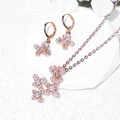 Elegant rose gold butterfly jewelry set featuring a zircon necklace and matching hoop earrings - Butterfly Hollow Necklace Style (HYL415004 Gold)