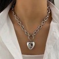 Silver chunky chain necklace with high-polish heart pendant on a white shirt - Silver Oval Large Ring Buckle Heart Pendant Necklace (HS1979-16)