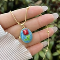 Detail of 18K gold tulip locket necklace with blue enamel and red flower on snake chain - 18K Gold / Blue Enamel With Red Tulip