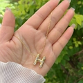 Collana con ciondolo a lettera H dorata incastonata con pietre di zircone scintillanti - Oro 18K / Oro H