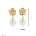 Detail view of 18k gold plated flower earrings with zircon paving and round white pearl - EH286 Flower Gold Style