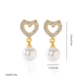 Detailed view of heart-shaped pearl drop earrings with dimensions 2.4cm by 1.0cm - EH289 Hollow Heart Gold Style