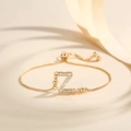 Detail of adjustable gold-plated bracelet featuring a zircon-studded letter Z charm - Letter Z