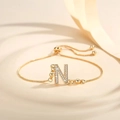 Adjustable gold letter N bracelet with pavé-set zircons and sliding toggle box chain - Letter N