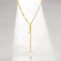 Detail of gold Y-shaped necklace featuring a letter J pendant and tassel cubic charm - Letter J