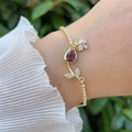 Detail van 18K vergulde tulpenarmband met paarse zirkoon en witte kristallen - Paarse Hoofdsteen Tulp Stijl (1)