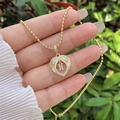 Macro detail of 18K gold plated heart pendant with zircon H letter on bead chain - 18K Gold / Gold H
