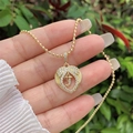 Detail view of a 18K gold-plated heart pendant with letter Y and white cubic zirconia - 18K Gold / Gold Y