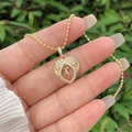 Detail showing the 18K gold plated heart pendant with zircon letter K and beaded chain - 18K Gold / Gold X