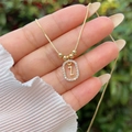 Detailed close-up of 18K gold plated letter Z pendant with sparkling cubic zirconia - Gold Z