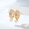 Close-up of gold hoop earrings with zircon floral accents and elegant pearl drop - Five-Petal Flower Style (EH864)