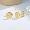 Elegant gold plated floral stud earrings with textured petals and a starburst center - Pentagram Radial Flower Style (EH945)