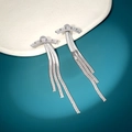 Detailed view of silver butterfly tassel earrings with rectangle zircon and snake chain - Arch Bridge Style (NE1282)