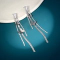 Macro view of long butterfly tassel earrings with silver snake chains and rhinestones - Rhinestone Butterfly Tassel Style (NE1295)