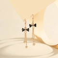 Elegant gold plated bow earrings with black glitter stones and long tassel chains - Gold Black Zirconia