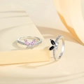 Close-up of butterfly rings with pink and black marquise stones on silver bands - US 7 / Silver White Rhinestone