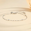 Minimalist silver beaded chain bracelet with geometric links and heart charm detail - Silver