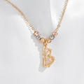 Golden letter B pendant necklace with tricolor beads on a polished chain for women - Letter B