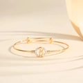 Detailed view of adjustable gold letter B bracelet featuring micro-pave crystal accents - Style B