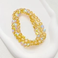 Glinsterende gele ster kralenarmband met iriserende AB-coating en kristallen facetten - 1 Stuk/Verpakking (8mm) / Champagne