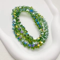 Drielagige armband met iriserende groene kristallen kralen in stervorm en AB-coating - 1 Stuk/Verpakking (10mm) / Groen