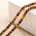 Polierte natürliche Tigerauge-Steinperlen für DIY-Schmuck mit goldbraunem Chatoyance-Effekt - 10 Stück/Packung (4mm) / Natürliches Gelbes Tigerauge
