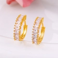 Elegante goudkleurige oorringen bezet met rechthoekige heldere zirkonia steentjes - Goud