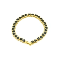 Detailed close-up of gold bracelet featuring heart-shaped blue zircon stone inlay work - Blue