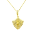 Macro shot of gold shield pendant with pavé zircon stones and a central hexagram star motif - Compass Starburst Style (DN240706-C)