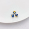Drie geëmailleerde blauwe en gouden kralen met mantra voor DIY-sieraden maken - Tussenkraal (7x9mm) / Blauw