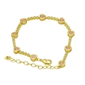 Detail of gold heart bracelet with pink gems, lobster clasp, and adjustable extender - Pink