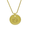 Macro shot of Cancer zodiac necklace with gold twist border and cubic zirconia inlays - Cancer