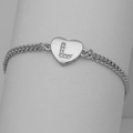 Macro detail of silver heart charm with cubic zirconia letter L on a cuban link chain - Silver Letter L