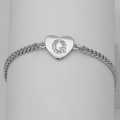 Close-up of silver heart charm with cubic zirconia letter Q on a cuban link chain - Silver Letter Q