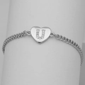 Macro view of silver Cuban chain bracelet with crystal-encrusted heart U-pendant - Silver Letter U