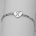 Macro shot of silver curb chain bracelet with heart pendant and letter X stone inlay - Silver Letter X