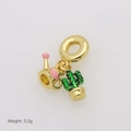 Macro view of gold watering can and cactus charms for jewelry bracelets and necklaces - Watering Can Cactus Style (DB250703-H)
