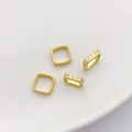 Macro detail of 14K gold filled square geometric bead with ornate cloud wave engravings - 14K Square Bead Frame 11mm