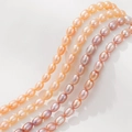 Natuurlijke zoetwater rijstparels in oranje en lavendel voor DIY sieraden maken - Oranje Rijstvorm (6-7mm)