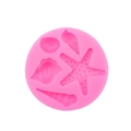 Detailed view of pink silicone mold with 5 cavity ocean starfish and seashell shapes - Pink