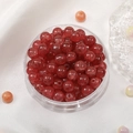 8mm red cracked glass round beads with translucent texture in a plastic storage box - Dark Red